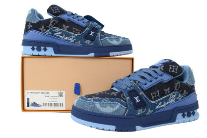 Blue sneakers with black patterns on a white background