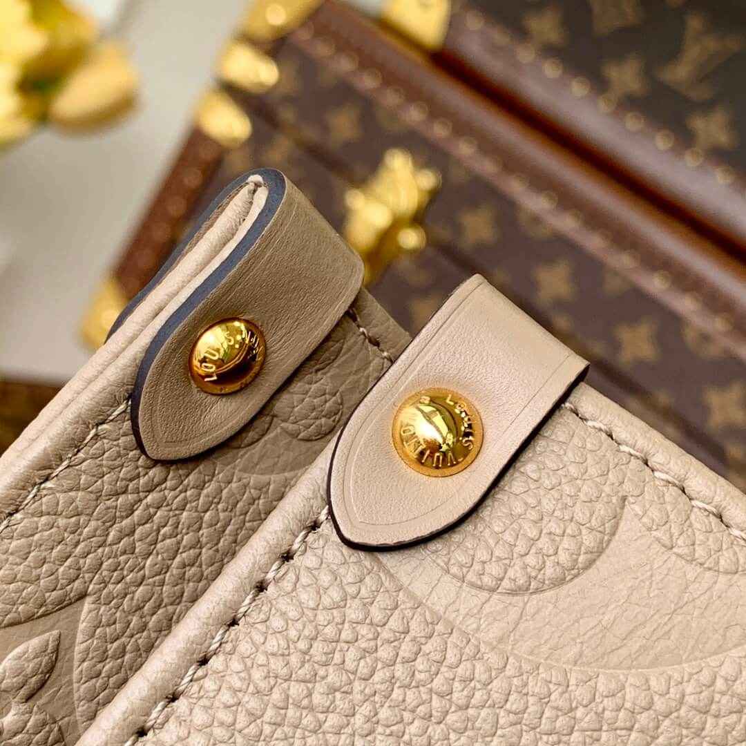 M45660 ONTHEGO PM tote bag Oversized monogrm empreinte leather Apricot