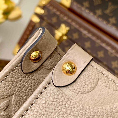 M45660 ONTHEGO PM tote bag Oversized monogrm empreinte leather Apricot